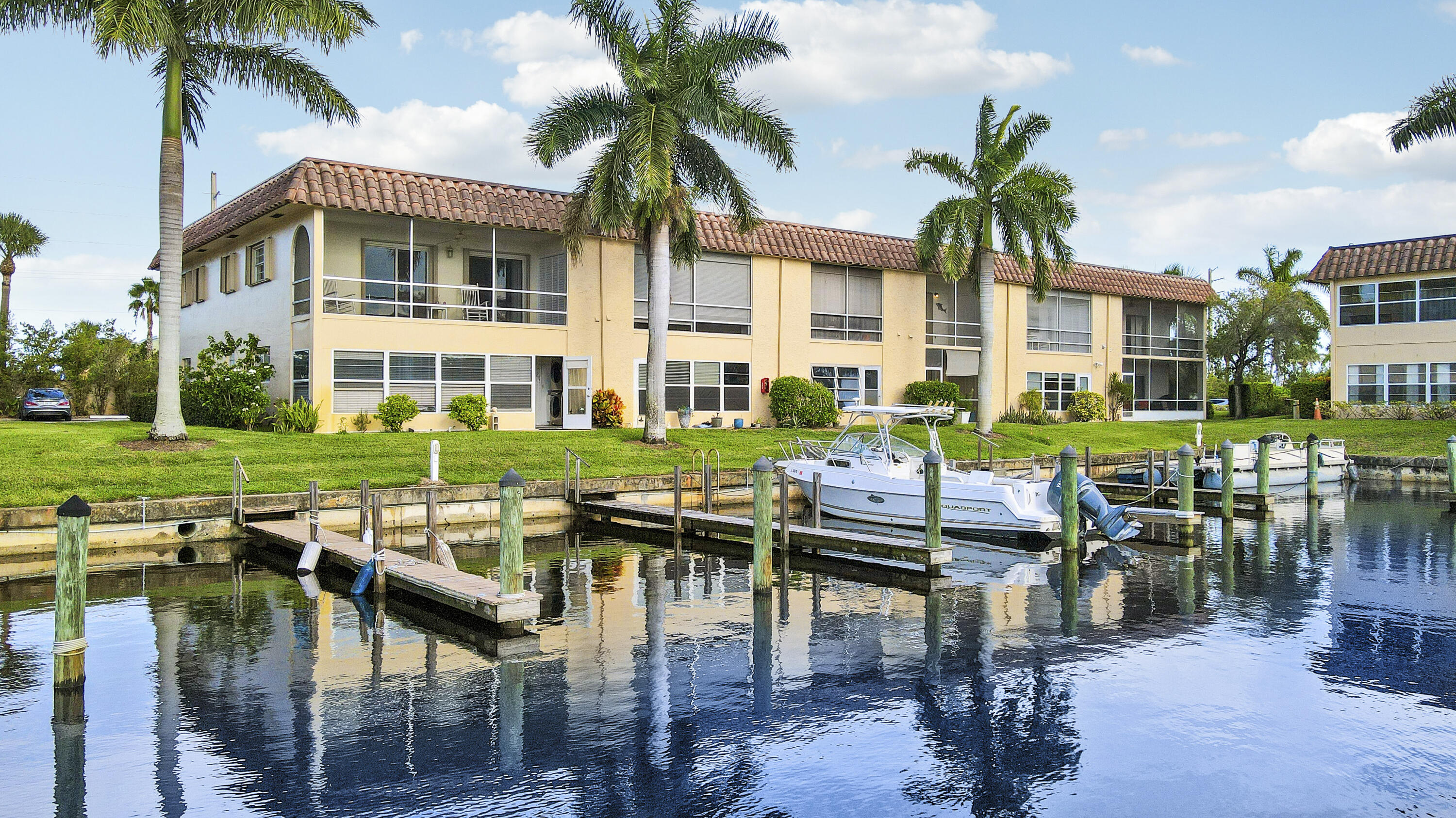 2600 South Kanner Highway, Unit Q8 Stuart, FL 34994 - Photo 1 of 52 a front view of a building with outdoor seating