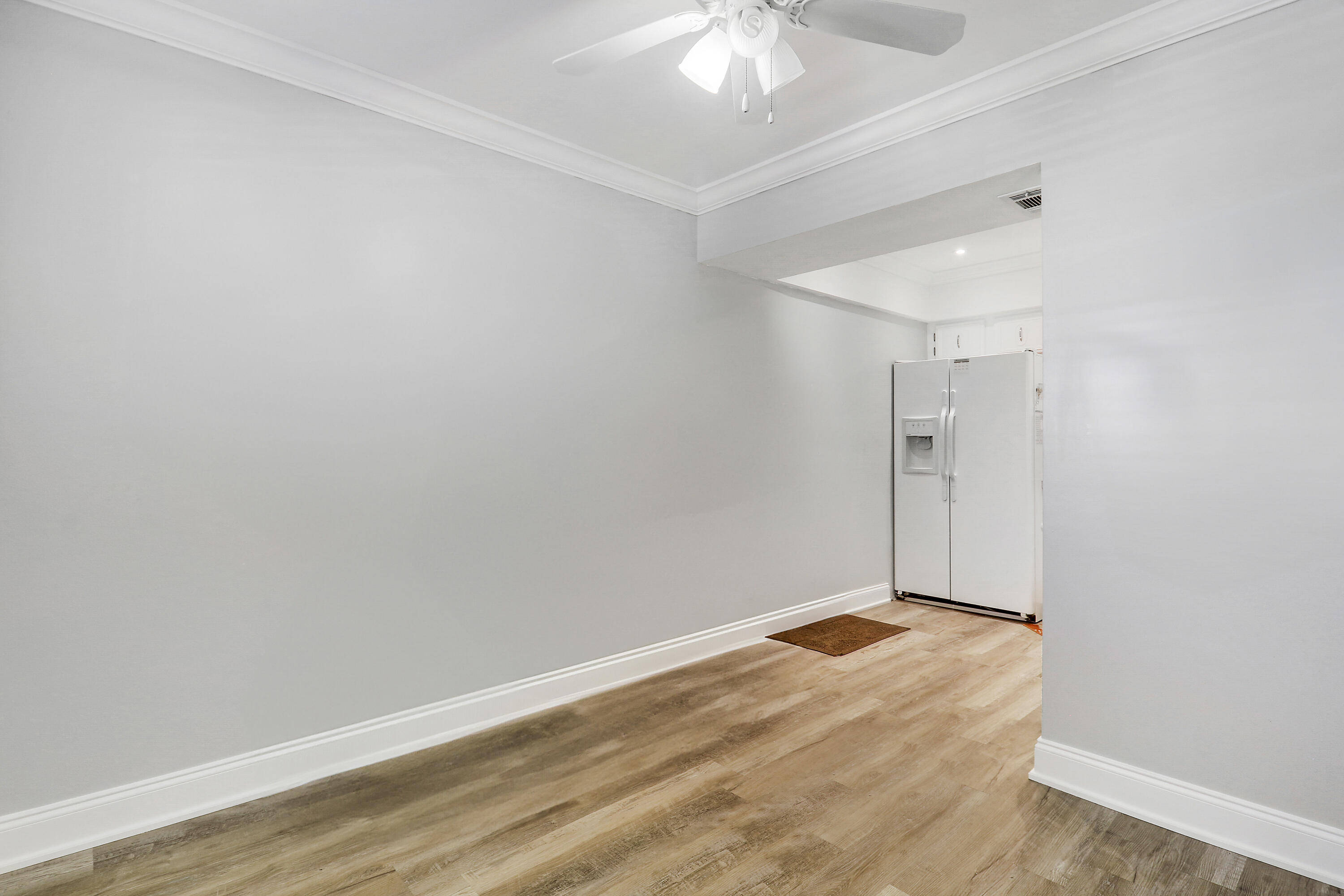 2600 South Kanner Highway, Unit Q8 Stuart, FL 34994 - Photo 14 of 52 a view of a room with wooden floor