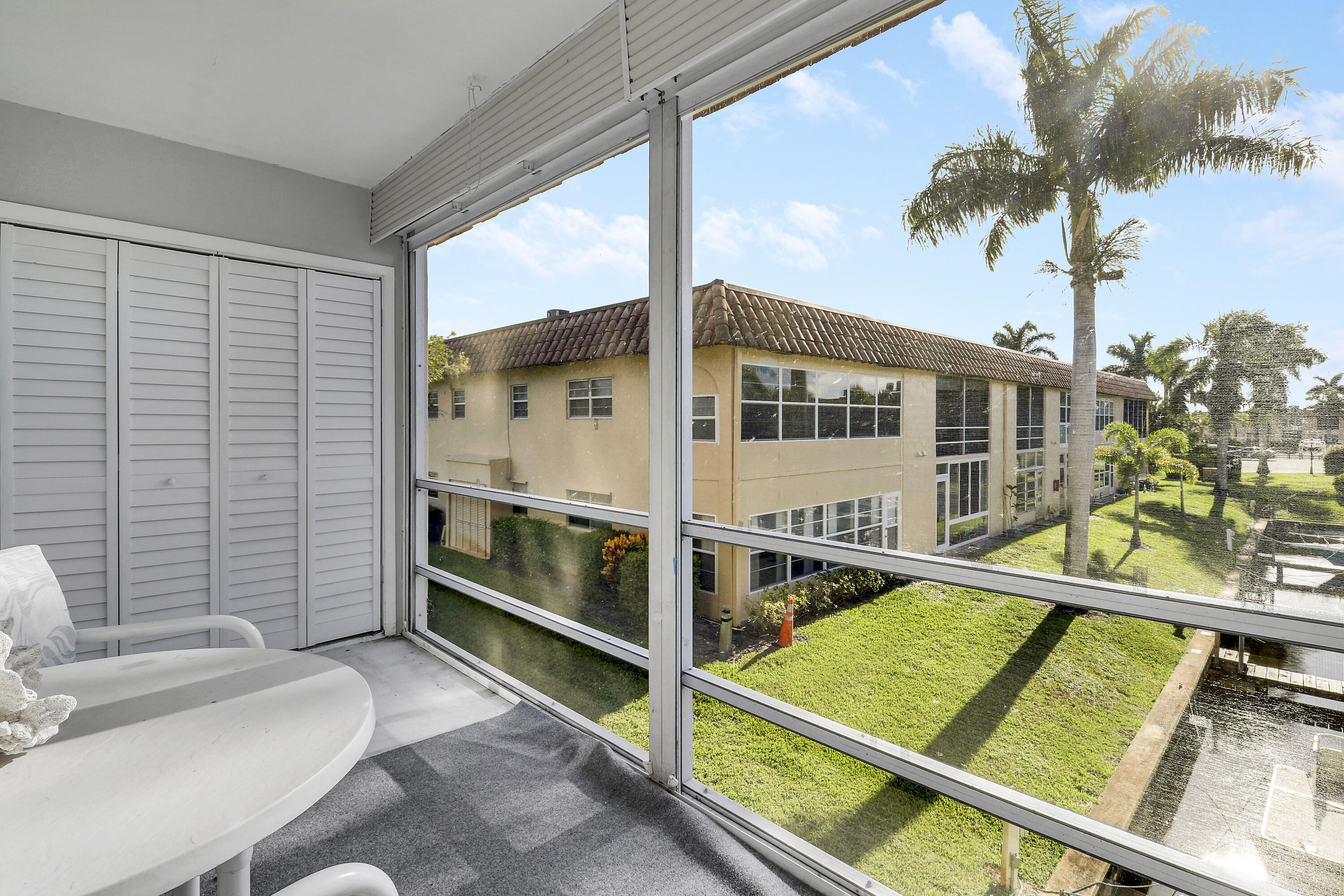 2600 South Kanner Highway, Unit Q8 Stuart, FL 34994 - Photo 26 of 52 a view of a balcony with chairs