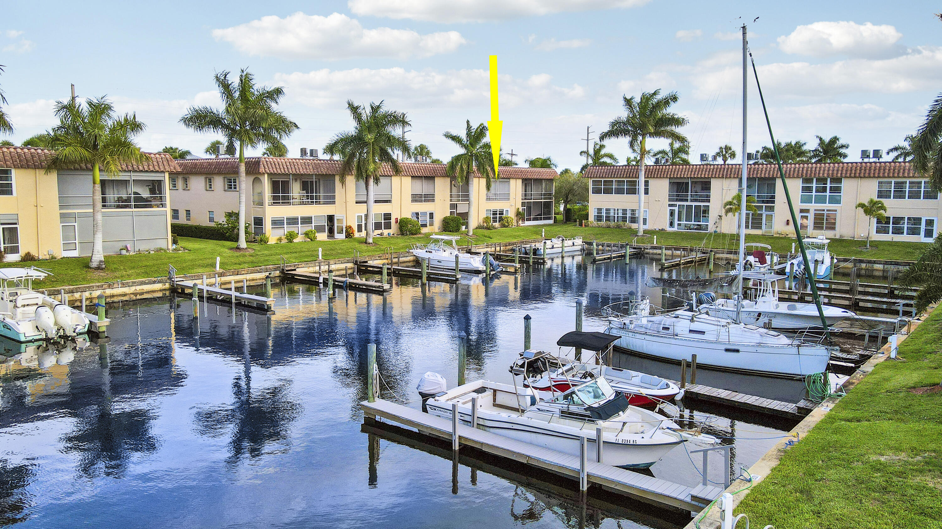 2600 South Kanner Highway, Unit Q8 Stuart, FL 34994 - Photo 30 of 52 a view of a patio with couches potted plants and water view