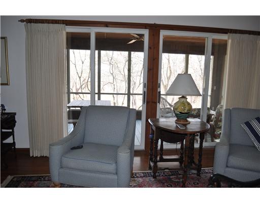 12 Verdi Road Westerly, RI 02891 - Photo 3 of 15 Porch. Walk out to the screened porch and enjoy a relaxing evening