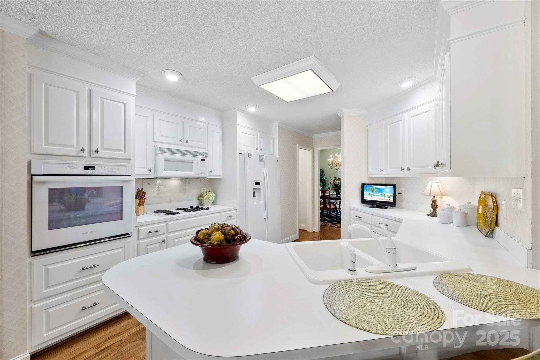 600 Queens Road Cherryville, NC 28021 - Photo 12 of 45 a kitchen with sink a stove and cabinets