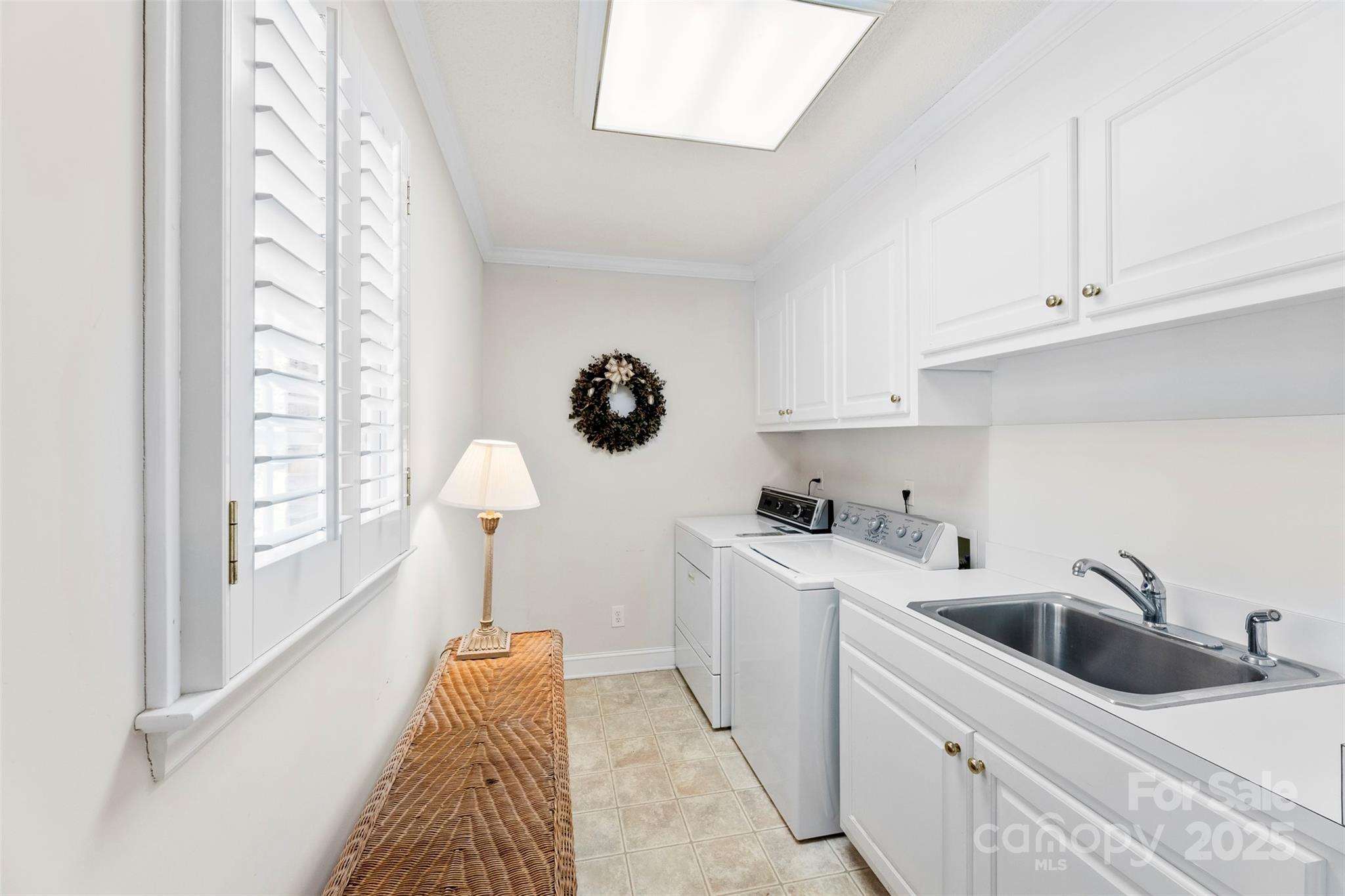600 Queens Road Cherryville, NC 28021 - Photo 15 of 45 a kitchen with a sink cabinets and a window