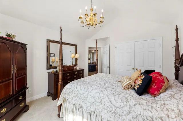 a bedroom with a bed and a closet