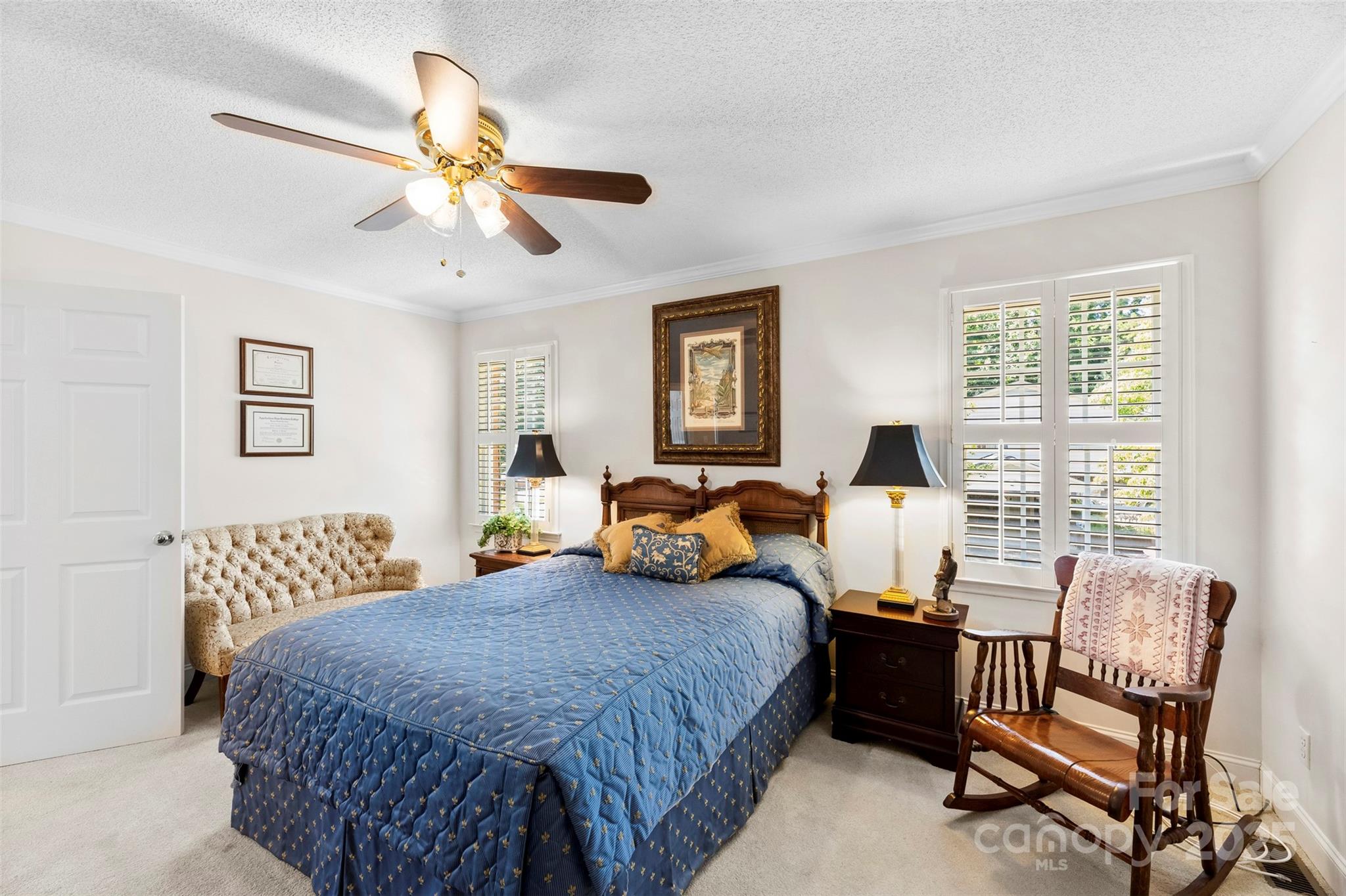 600 Queens Road Cherryville, NC 28021 - Photo 26 of 45 a bedroom with a bed a couch and dresser