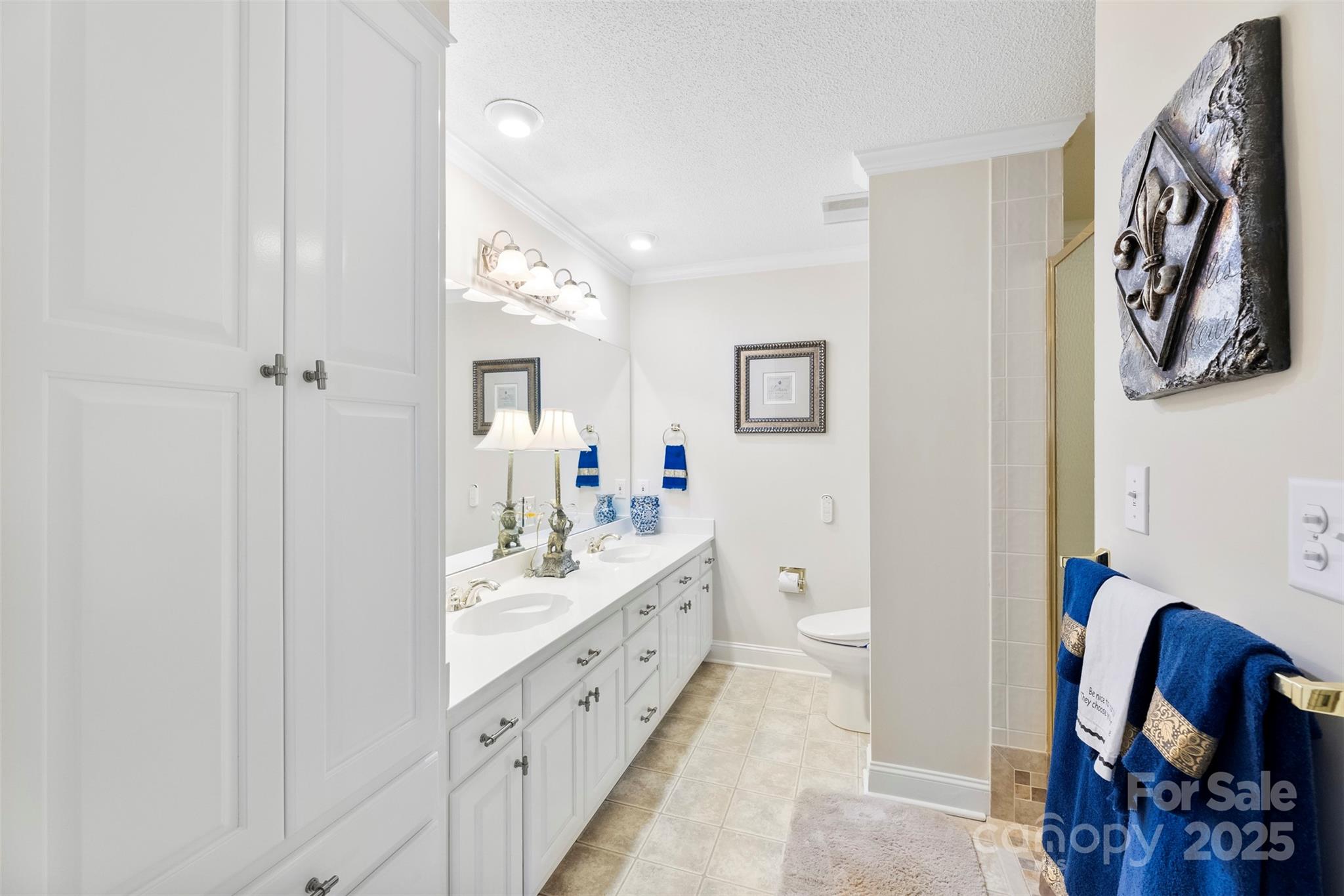 600 Queens Road Cherryville, NC 28021 - Photo 28 of 45 a spacious bathroom with a mirror a sink and a mirror