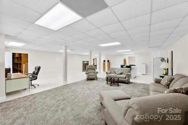 a living room with furniture and a couch