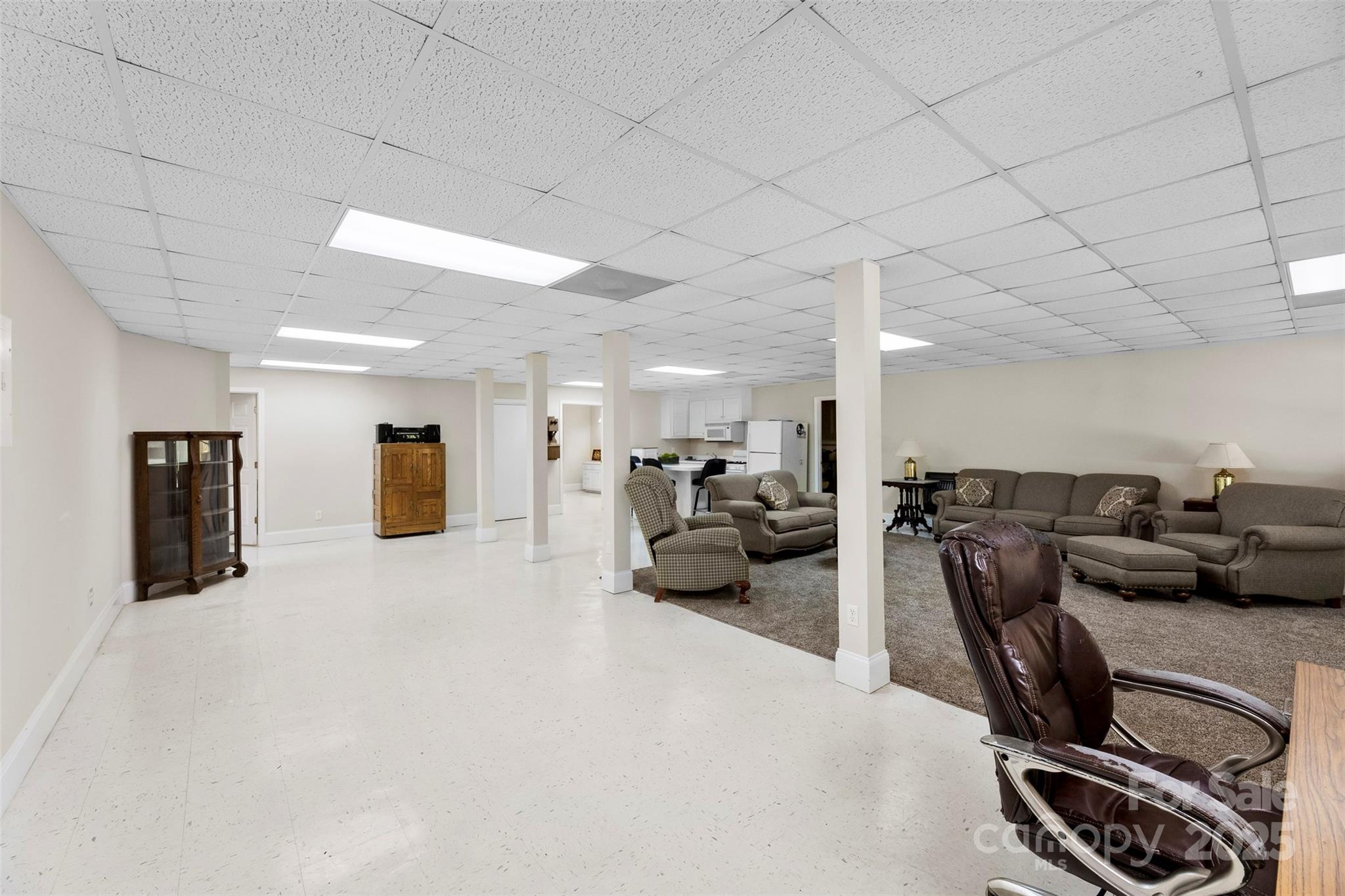 600 Queens Road Cherryville, NC 28021 - Photo 35 of 45 a living room with furniture a couch and a flat screen tv