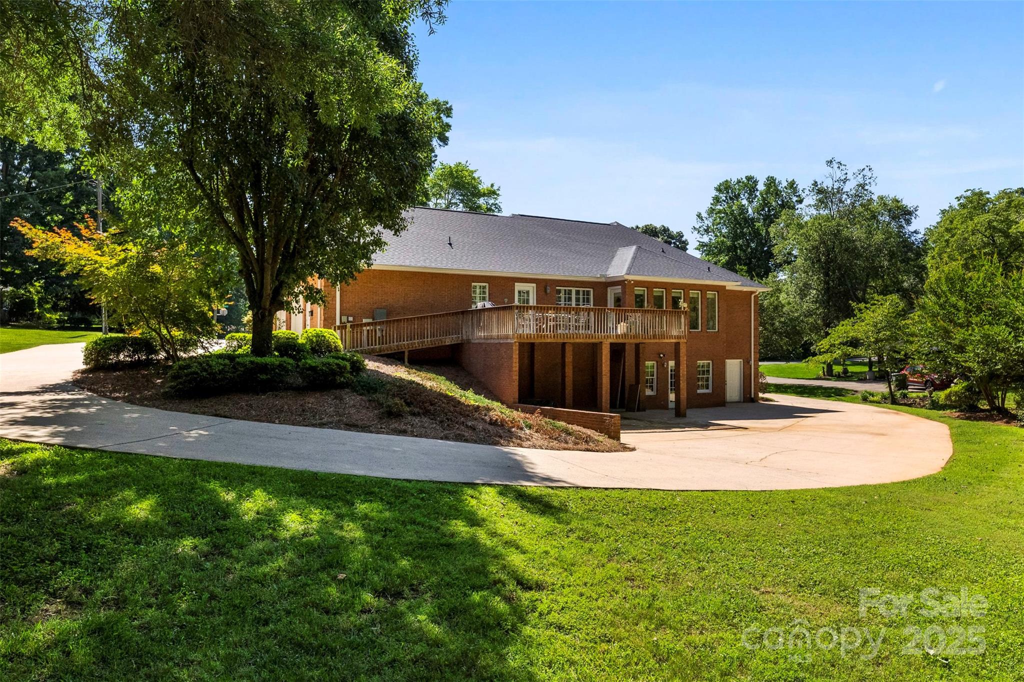 600 Queens Road Cherryville, NC 28021 - Photo 41 of 45 a view of a house with backyard and trees