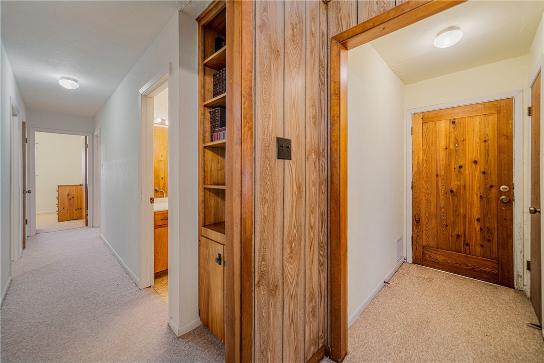 5469 Sunset Trail Robstown, TX 78380 - Photo 17 of 37 a view of a hallway with rooms