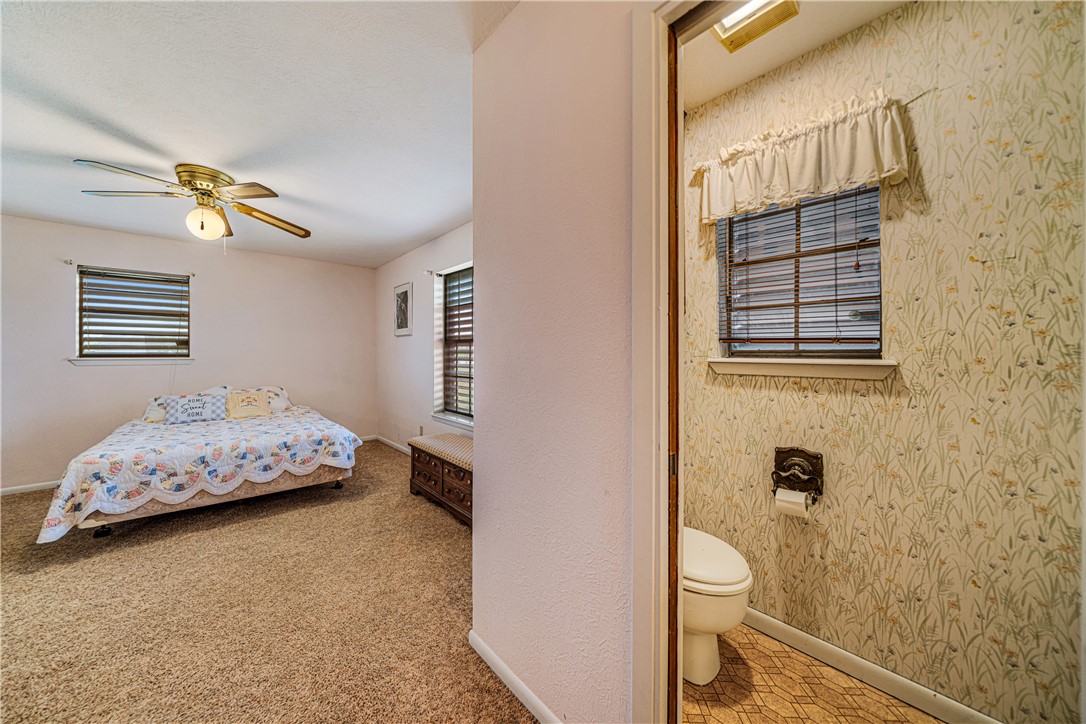 5469 Sunset Trail Robstown, TX 78380 - Photo 25 of 37 a bedroom with a bed and a window