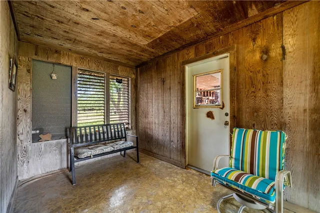a view of a bedroom with furniture and staircase