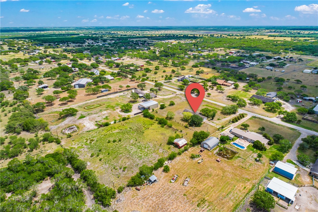 5469 Sunset Trail Robstown, TX 78380 - Photo 33 of 37 an aerial view of residential houses with outdoor space and trees