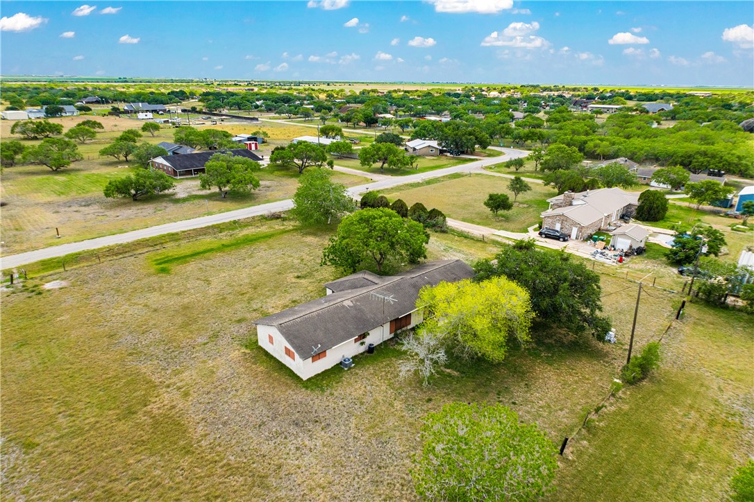 5469 Sunset Trail Robstown, TX 78380 - Photo 35 of 37 an aerial view of residential houses with outdoor space and swimming pool