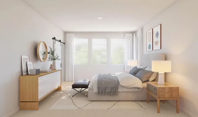 a bathroom with a double vanity sink a mirror and a bathtub