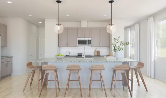 a large kitchen with stainless steel appliances kitchen island granite countertop a sink and cabinets