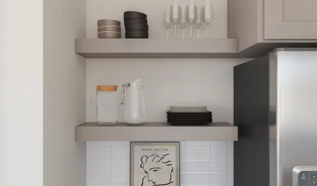 a view of a dining room with furniture and a window
