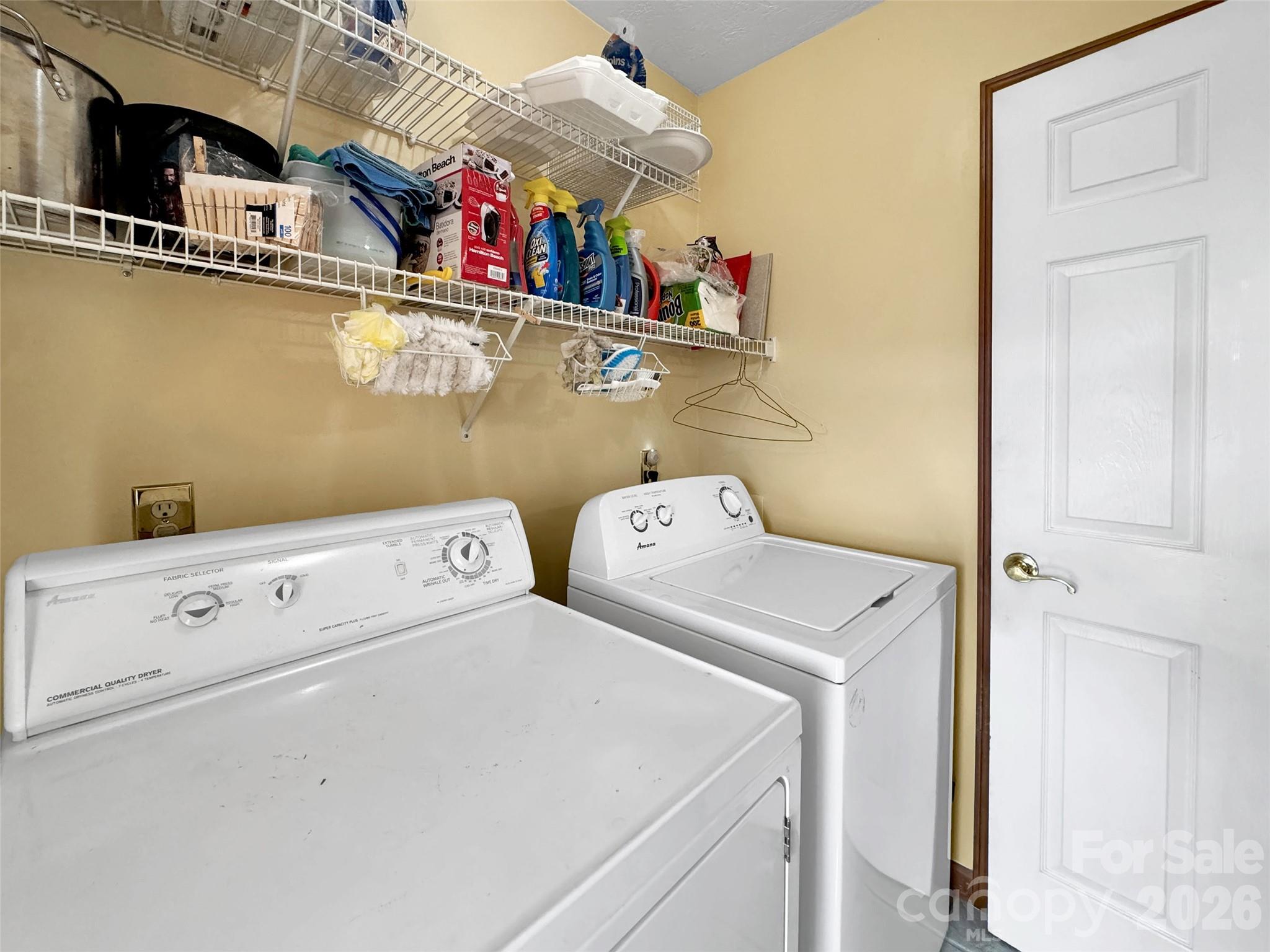 371 Falcon Ridge Drive Waynesville, NC 28786 - Photo 30 of 48 a utility room with dryer and washer
