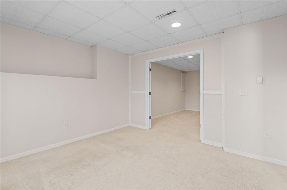 2617 Rising Sun Road Slatington, PA 18080 - Photo 40 of 58 Plush carpeting and crisp white trim enhance this versatile lower level living area.