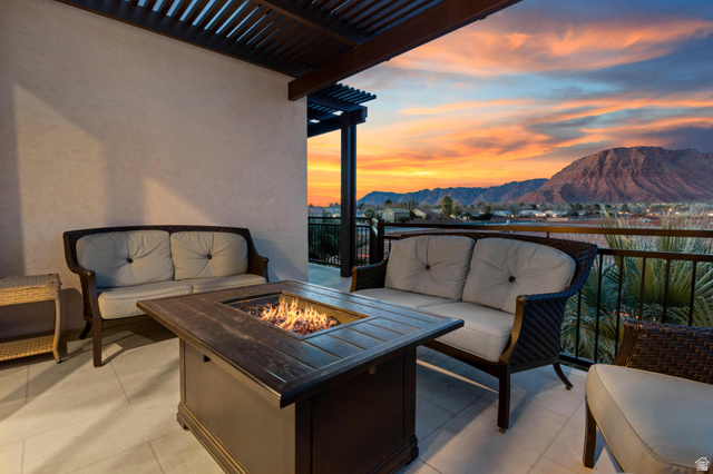 2600 Ocotillo Way, Unit 31 Santa Clara, UT 84765 - Photo 3 of 73 Covered patio with a mounted pergola, tile flooring, stucco wall, and metal railing