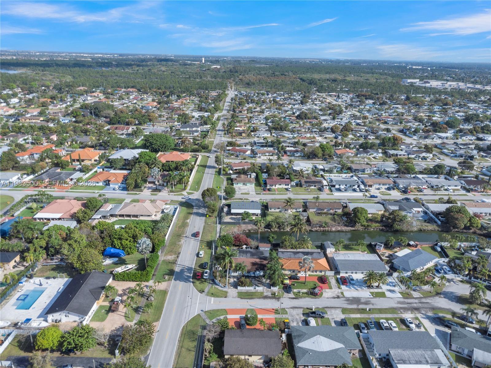 12691 Southwest 190th Street Miami, FL 33177 - Photo 44 of 46 an aerial view of residential houses with city view