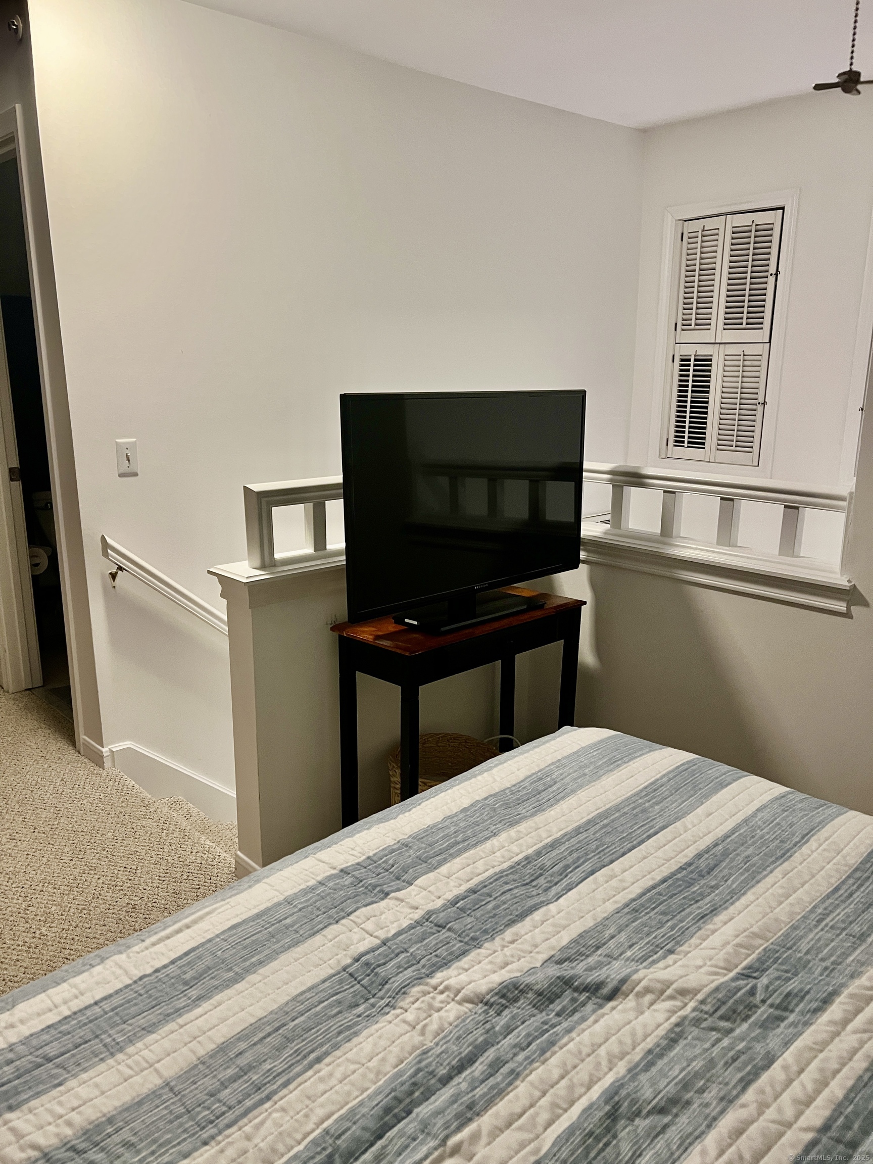 1623 Old Pond Lane, Unit 1623 Norwich, CT 06360 - Photo 18 of 40 a bedroom with a bed and a flat screen tv