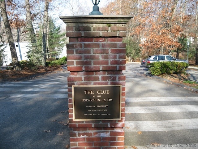 1623 Old Pond Lane, Unit 1623 Norwich, CT 06360 - Photo 21 of 40 a sign on the side of a building