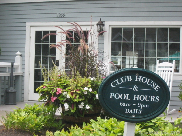 1623 Old Pond Lane, Unit 1623 Norwich, CT 06360 - Photo 25 of 40 a sign on the side of a building