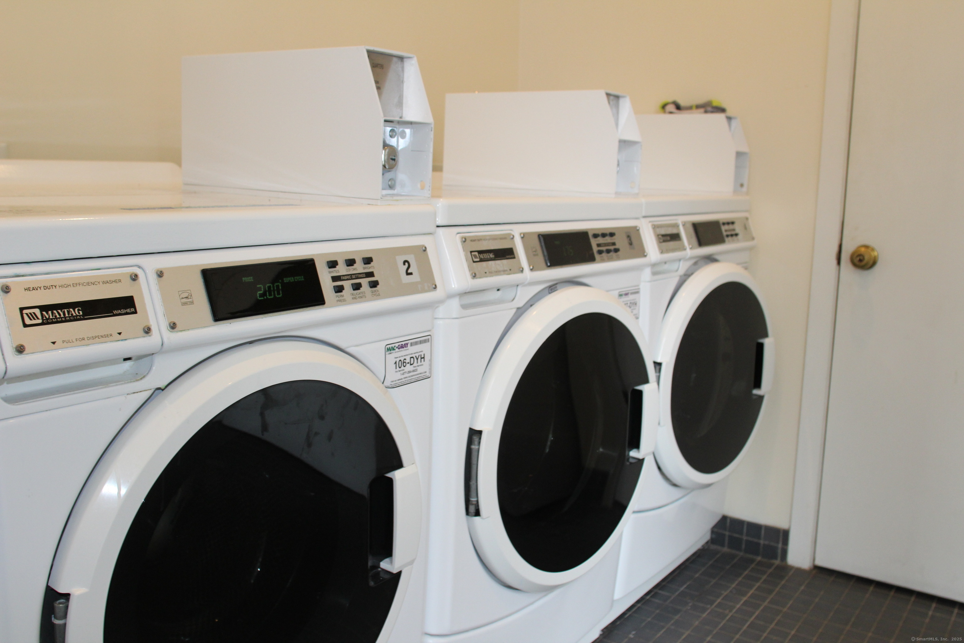 1623 Old Pond Lane, Unit 1623 Norwich, CT 06360 - Photo 33 of 40 a close up view of washer and dryer