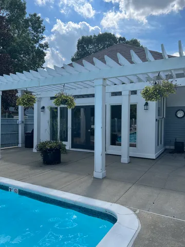 an aerial view of a house with garden