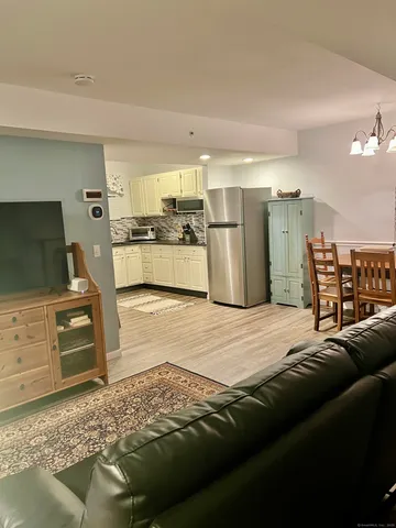 a view of a swimming pool with a yard