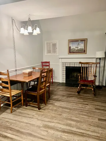 a bed room with a bed and dresser