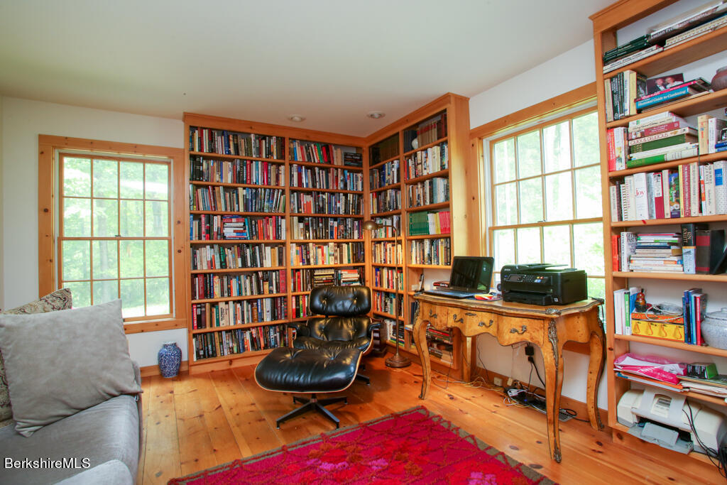 142 Main Road Monterey, MA 01230 - Photo 18 of 32 a living room with furniture and a book shelf