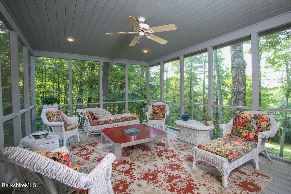 142 Main Road Monterey, MA 01230 - Photo 6 of 32 a living room with furniture and a large window