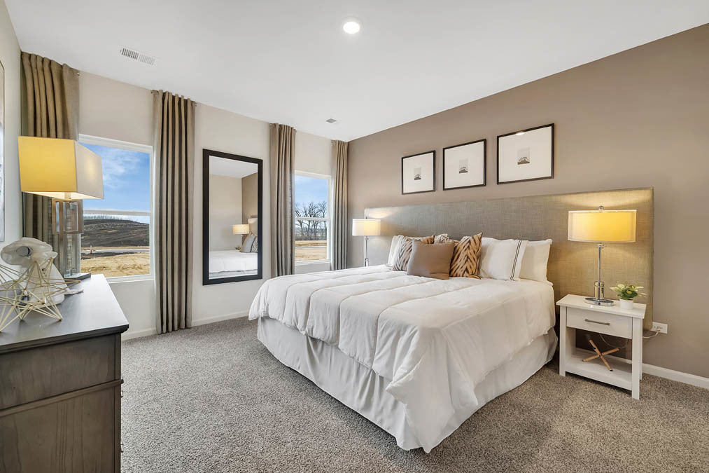 1122 Bluebell Lane Bartlett, IL 60103 - Photo 8 of 15 a bedroom with a large bed and a window