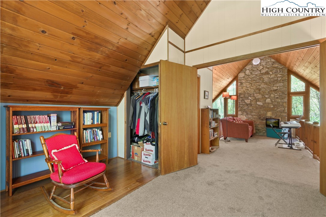 845 Trout Lake Road Deep Gap, NC 28618 - Photo 16 of 38 a room with furniture and a large window