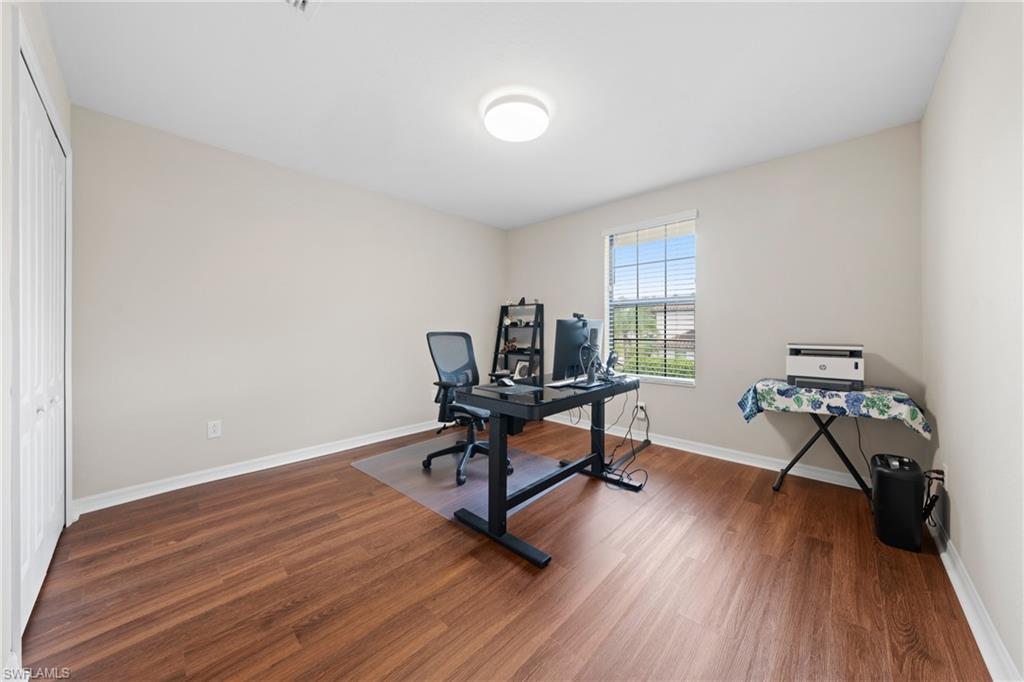 4228 Raffia Palm Circle Naples, FL 34119 - Photo 25 of 50 Office space with dark wood finished floors and baseboards