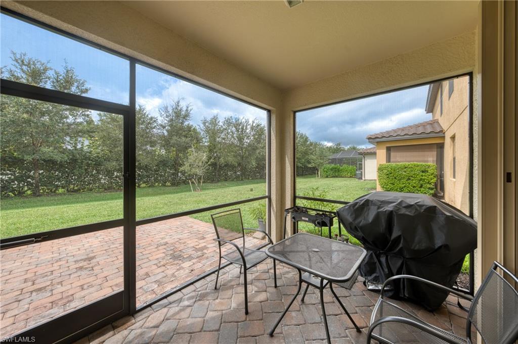 4228 Raffia Palm Circle Naples, FL 34119 - Photo 31 of 50 View of sunroom