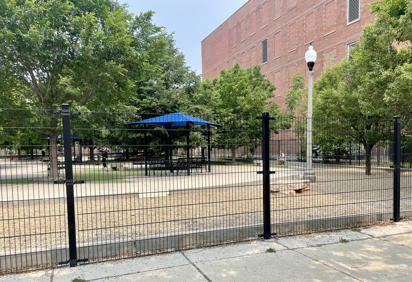 1355 West Washington Boulevard, Unit 4A Chicago, IL 60607 - Photo 19 of 24 a view of a patio with a table and chairs under an umbrella