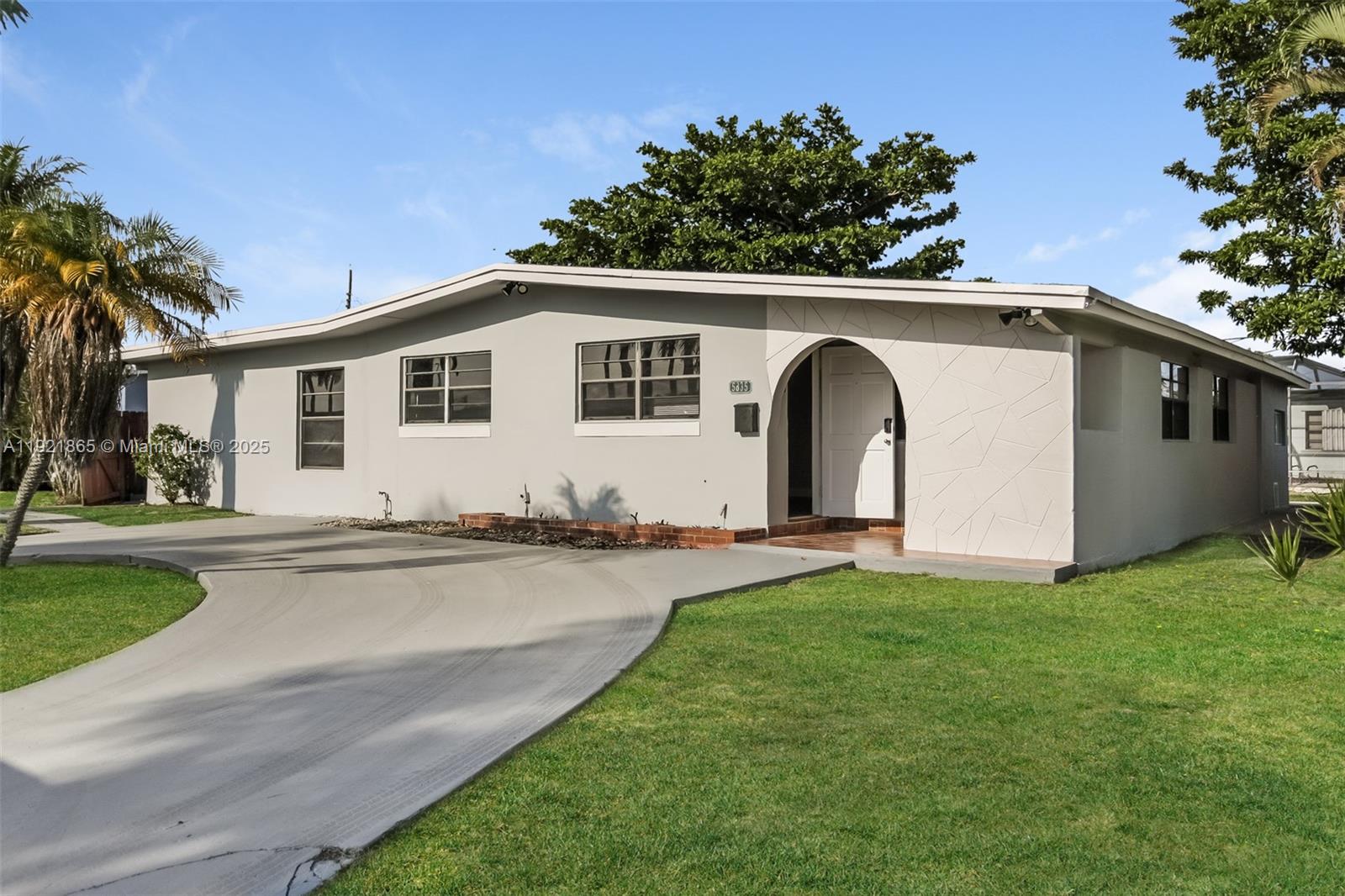 5835 Southwest 117th Avenue Miami, FL 33173 - Photo 2 of 16 a view of a yard with a patio