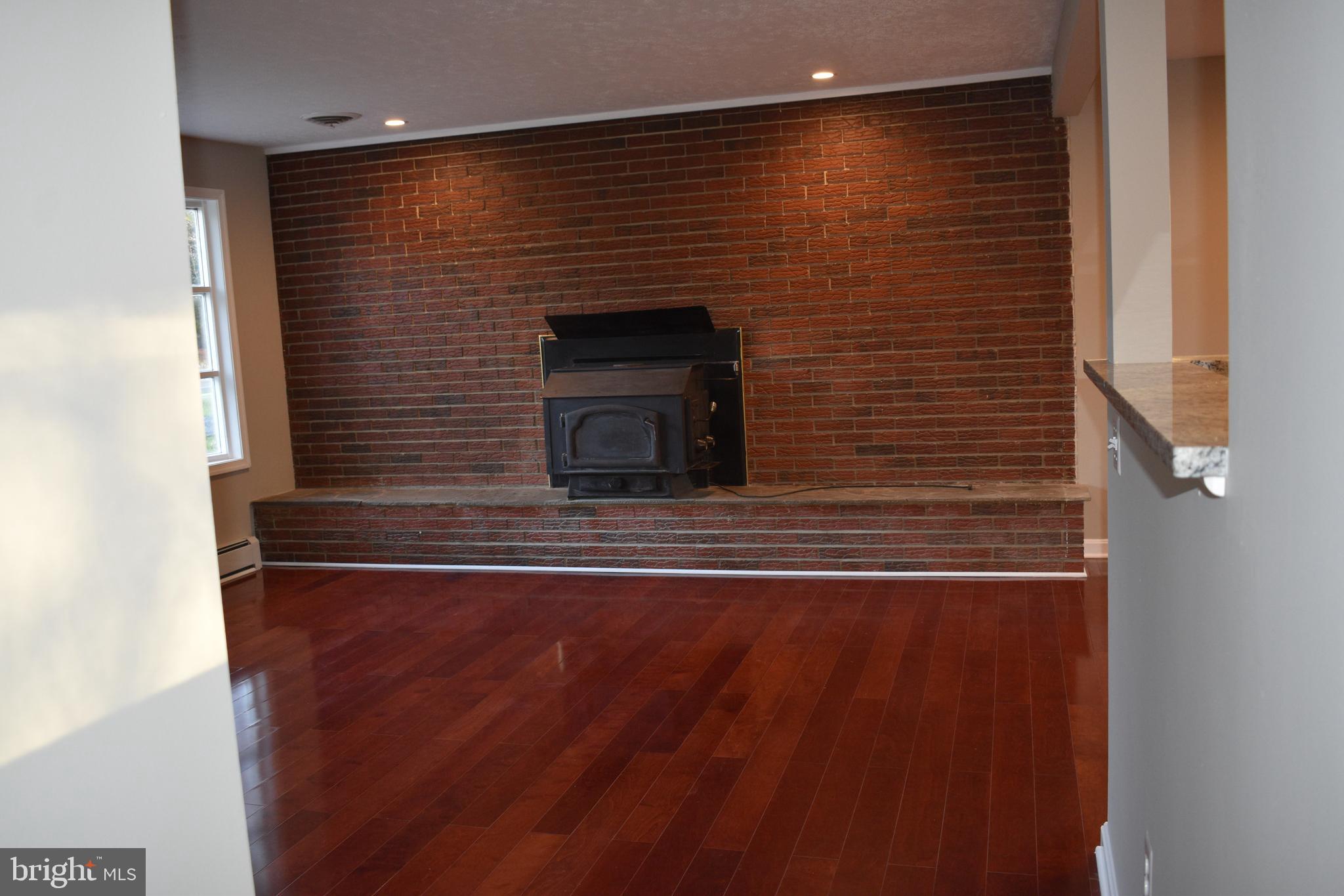 1401 Cape St Claire Road Annapolis, MD 21409 - Photo 13 of 26 Wood burning stove