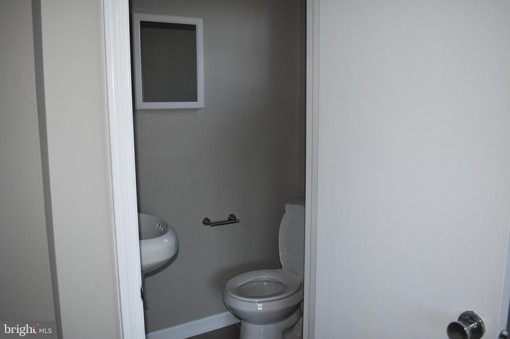 1401 Cape St Claire Road Annapolis, MD 21409 - Photo 16 of 26 Master half bath