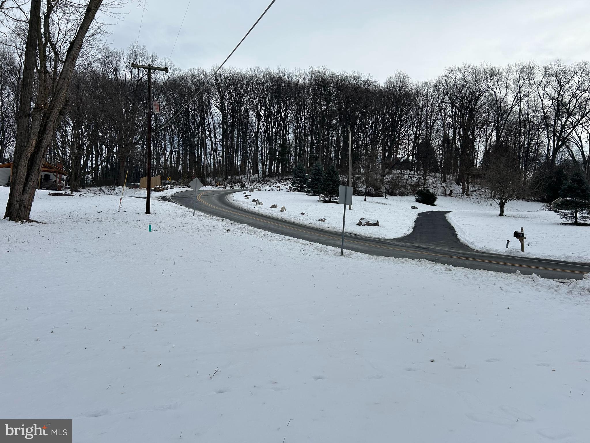 0 Cedar Top Road Reading, PA 19607 - Photo 19 of 19 a view of a road with a bench in the background