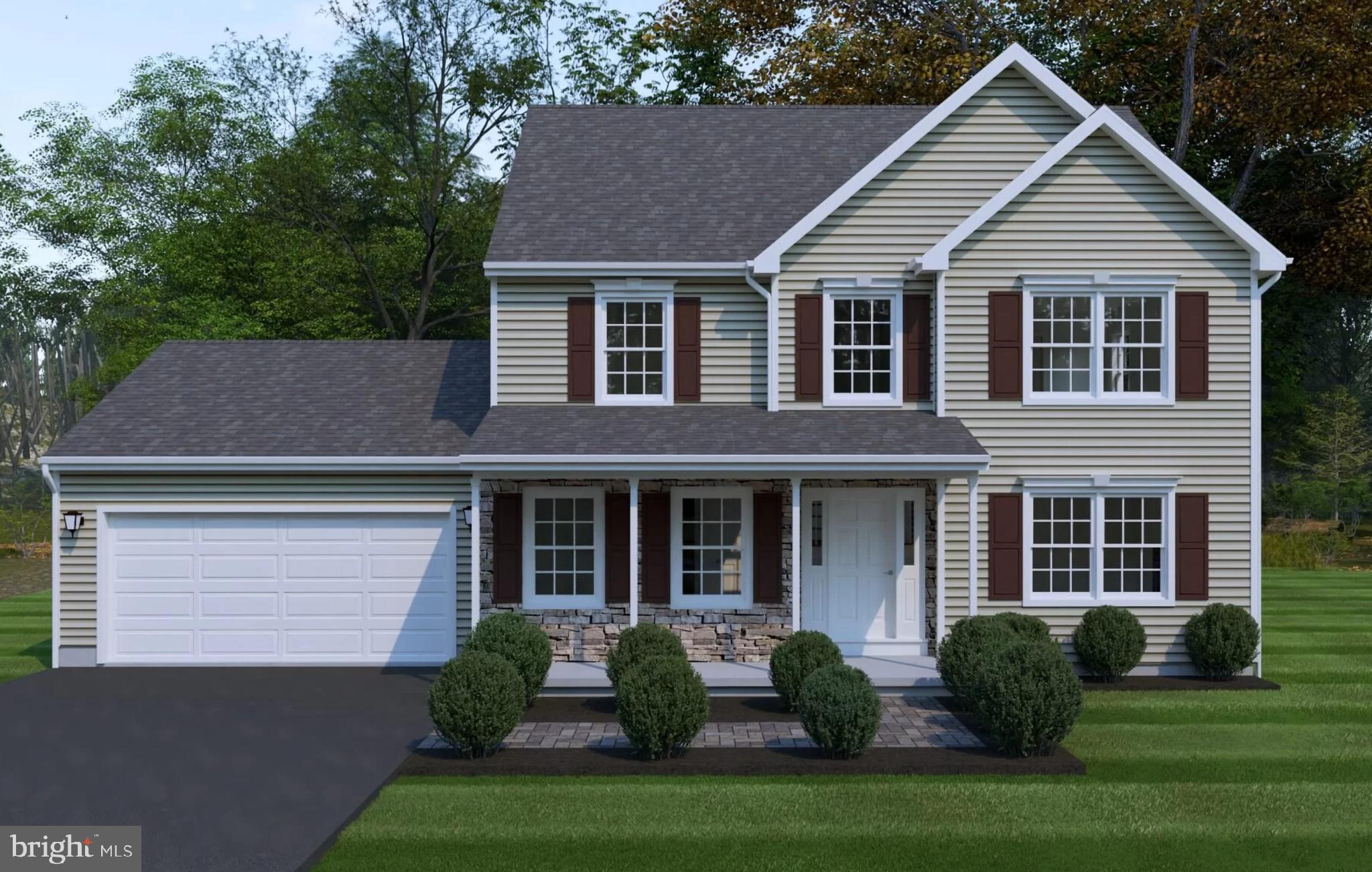 0 Cedar Top Road Reading, PA 19607 - Photo 2 of 19 a front view of a house with a garden and plants