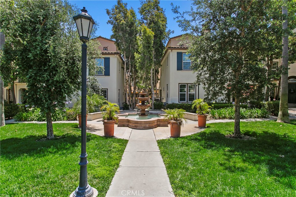 92 Sansovino Ladera Ranch, CA 92694 - Photo 24 of 24 Fountain in the center of the walkway near the property. Turns off in the evening.