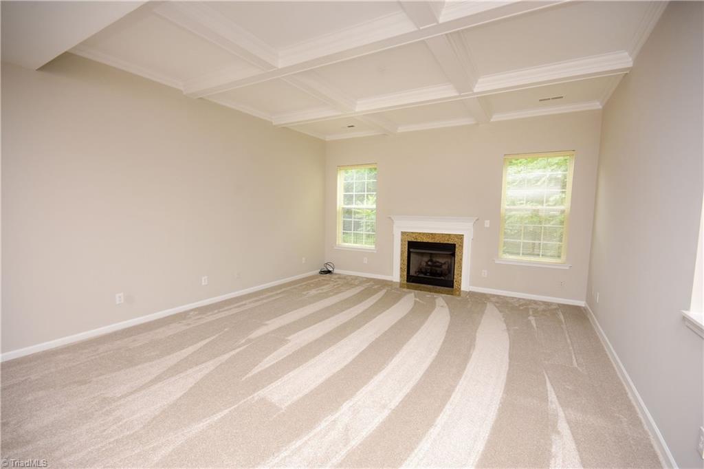 3092 Sycamore Point Trail High Point, NC 27265 - Photo 7 of 30 Great Room with Fireplace and Coffered Ceiling