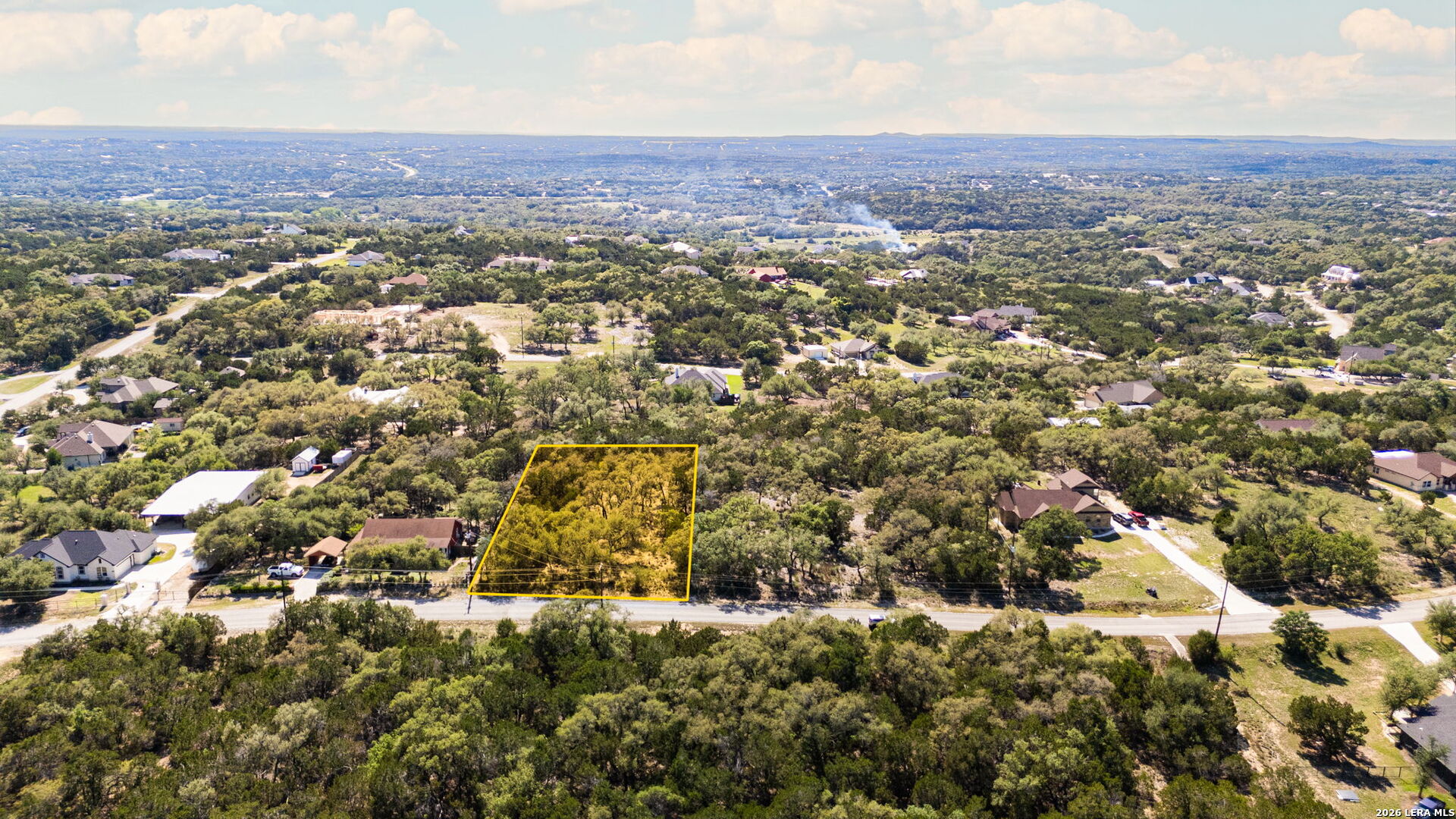 1158 Madrone Road Fischer, TX 78623 - Photo 3 of 8 an aerial view of residential house and green space
