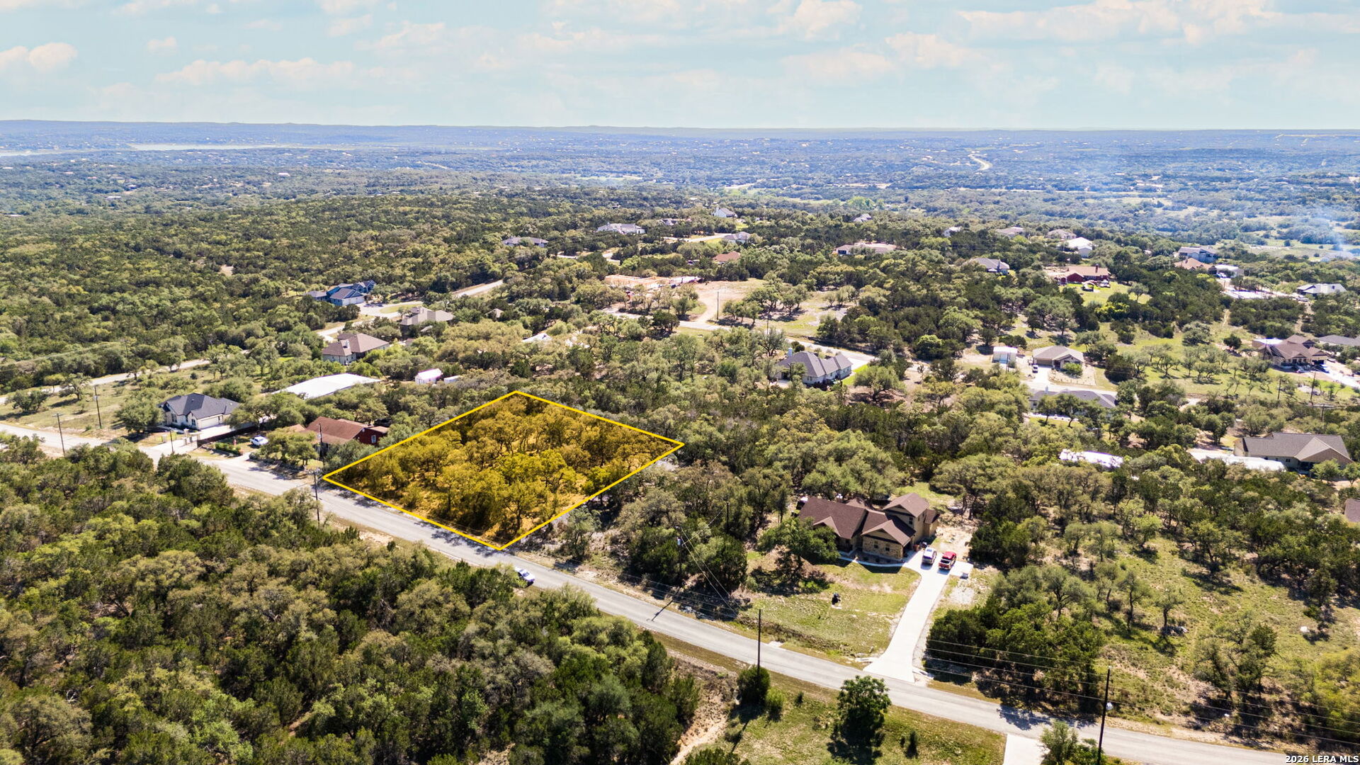 1158 Madrone Road Fischer, TX 78623 - Photo 4 of 8 an aerial view of residential house and green space
