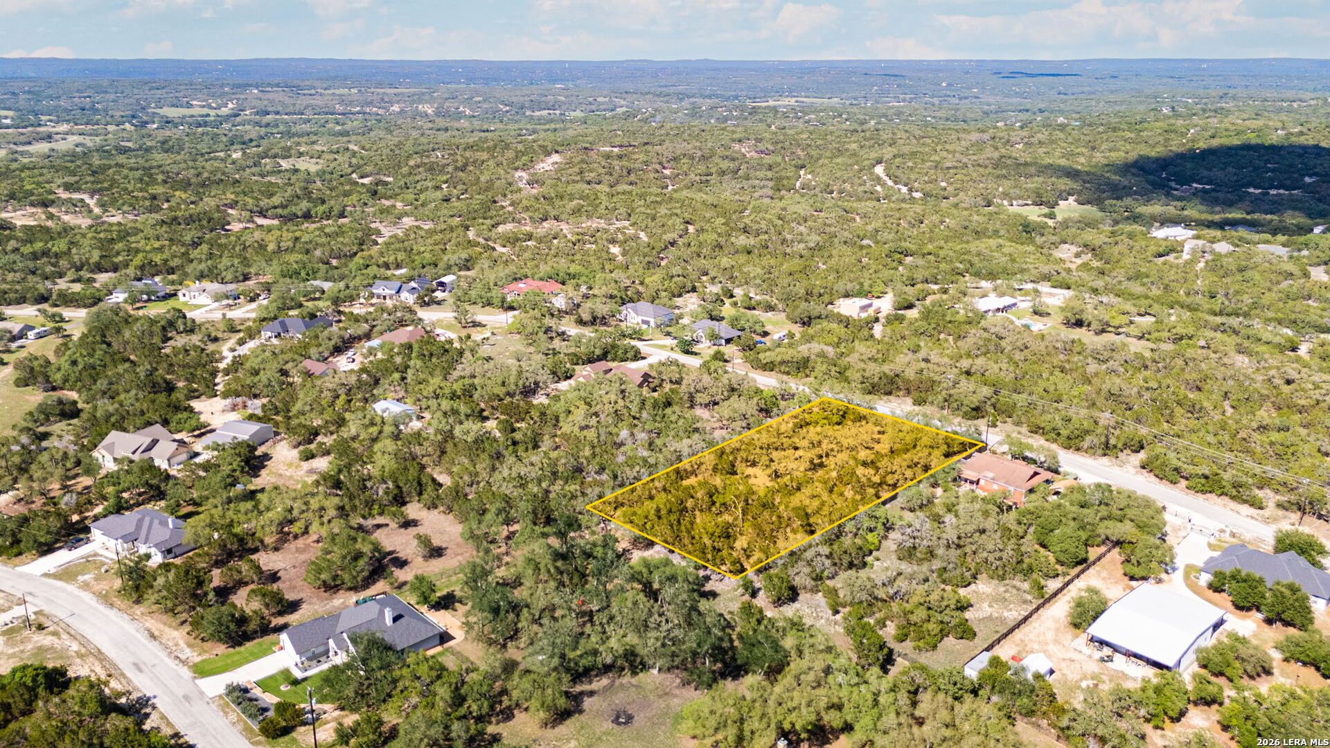 1158 Madrone Road Fischer, TX 78623 - Photo 5 of 8 a view of city and an ocean