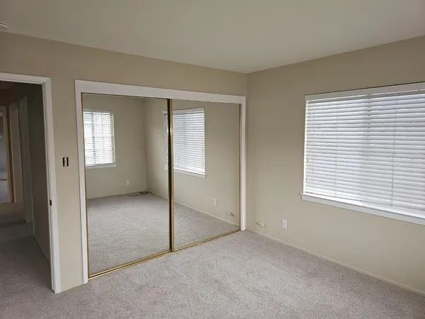 an empty room that has a window